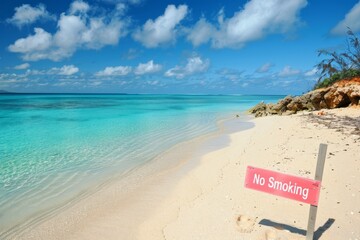 beach scene with a "No Smoking" sign in the sand