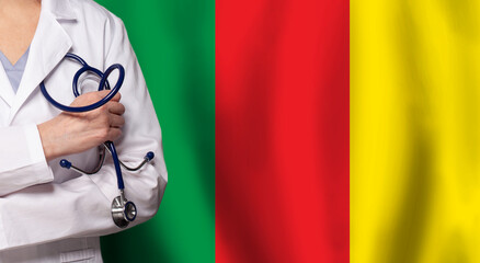 Cameroonian medicine and healthcare concept. Doctor close up against flag of Cameroon background - 793648833