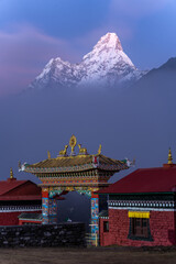 Sunset shot of Buddhism Temple with Ama dablam in the background in Tengboche, Khumbu, Nepal