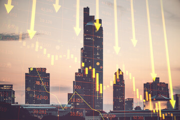 Abstract red crisis arrows on blurry city texture. Economic recession, financial fall and crash...