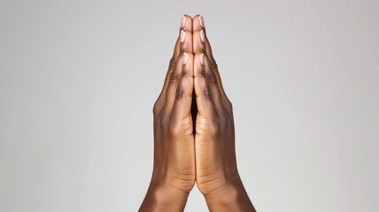 hands praying with plain background