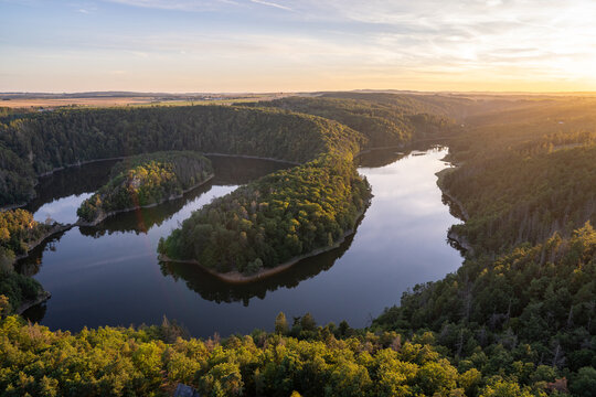 Stunning sunset over the river taken from aerial view near Bítov castle, Czech republic