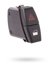 Black plastic block of car control panel with red emergency stop button for signal lights, spare part on a white isolated background in a photo studio for sale and installation in a auto service.