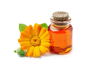 Fotobehang Aromatherapy essential calendula oil on white backgrounds © margo555