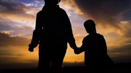 silhouette woman mother child kid sunset happy family, nurturing mother figure, sunset motherly...