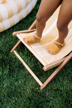 Yellow Huarache Sandals on Summer Loungchair