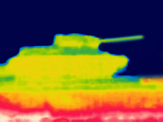 A monument, a tank on a pedestal.. Image from thermal imager device.