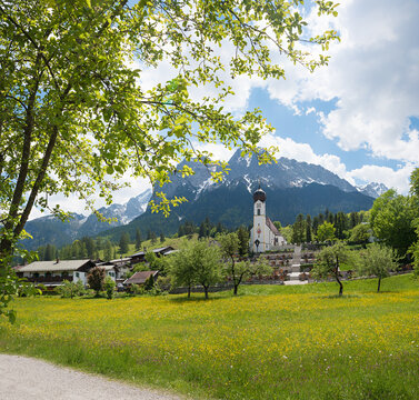 spring landscape village church Obergrainau and cemetary, Wetterstein alps