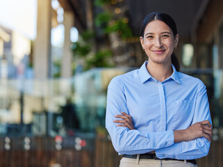 Business portrait, woman and restaurant owner with arms crossed at entrance for startup, service or confidence. Entrepreneur, face and girl at cafe with career, goal and pride for coffee shop success
