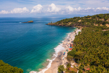Bali, Indonesia: Aerial view of the dramatic Virgin beach near Amlapura and Candidasa in eastern Bali Karangasem region