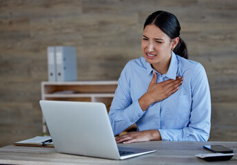 Stress, laptop and woman in office with chest pain from bad news, email or negative business review...