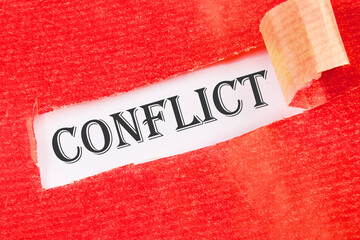 Conflict word on a white background under torn paper - obrazy, fototapety, plakaty