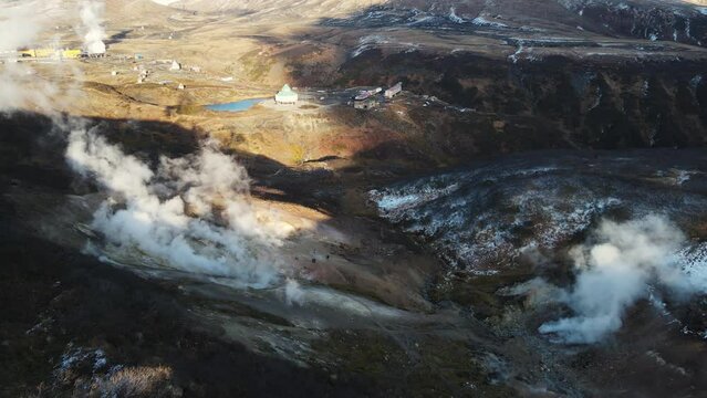 drone footage over the valley of geysers in the mountains