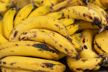 ripe yellow bananas as background.