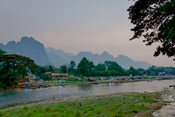 View of the mountains and river of Vang Vieng in Laos at sunset