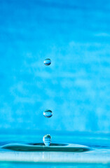 close-up shot of a bounce of a water droplet