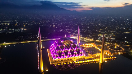Sunrise of Al-Jabbar mosque. Drone view beautiful mosque with colorful lights. 