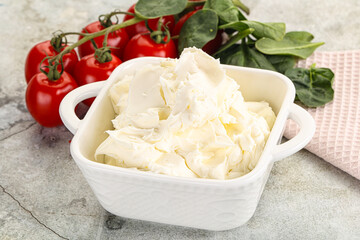 Soft cream cheese in the bowl