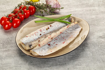 Marinated herring fillet with green onion