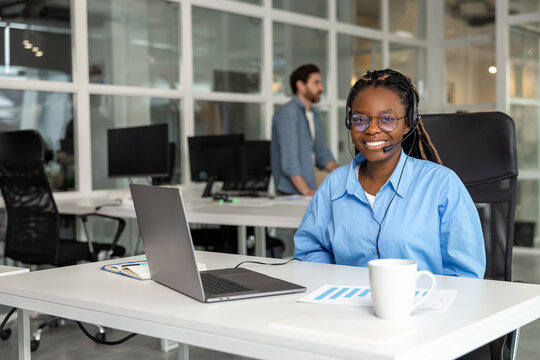 Smiling woman call center agent consulting customer service support