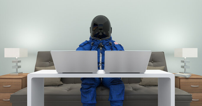 Astronaut In Space Suit Working With Laptop Computers. Writing Code. Space And Technology Related Scene.