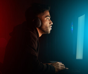 Gaming, pc and man in pro esports competition with online video games and virtual challenge. Gamer,...