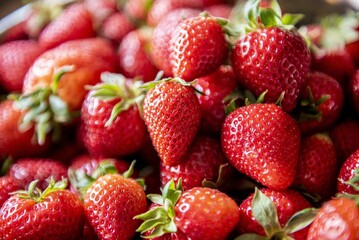 Strawberries, with their juicy sweetness and bright red color, symbolize summer's essence, adding...