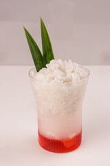 Es Kelapa Kopyor. Iced Dessert Drink Made of Natural Coconut Curd and Pandan Syrup.