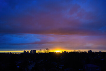 Dramatic sunrise and cityscape