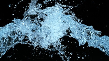 Water Splashes Flying in the Air on Black Background