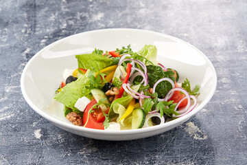 greek salad on the grey background