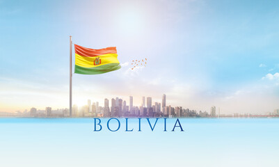 Bolivia national flag waving in beautiful building skyline. - obrazy, fototapety, plakaty
