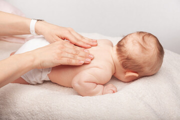 Baby chiropractic back treatment