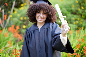 University, graduation and portrait of happy woman with diploma for education, achievement or success ceremony on campus. Student, bokeh and person with certificate for satisfaction, smile or event