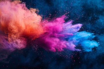 Abstract colorful powder explosion on a dark background