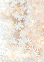 A close up detail of delicate, crystalline structures of the frost snowflake pattern on glass or window on a winter day.