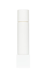 white plastic bottle package for body cosmetics on a white cube podium. Container lotion, tonic, serum, cream, bottle mockup isolated on transparent background, png