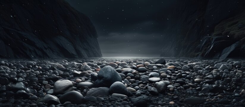 Dark beach with rocks under gloomy sky