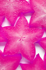 Top View of Sliced Fresh Star Fruits in Surreal Pop Art Styled Orchid Purple for Backdrop and Banner