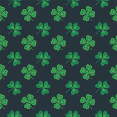 Seamless pattern of clover leaves on a dark background. Vector graphics.