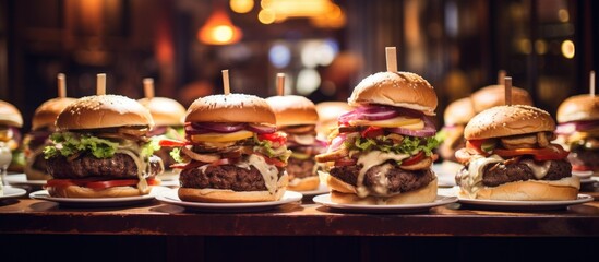 Several burgers arranged on plates