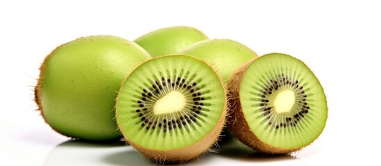 Fototapeta premium Half kiwi fruit on white surface