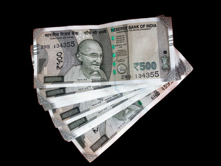 500 Rupees, Indian Currency banknote photography on black background.