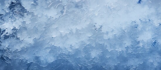 Frosty window against blue sky
