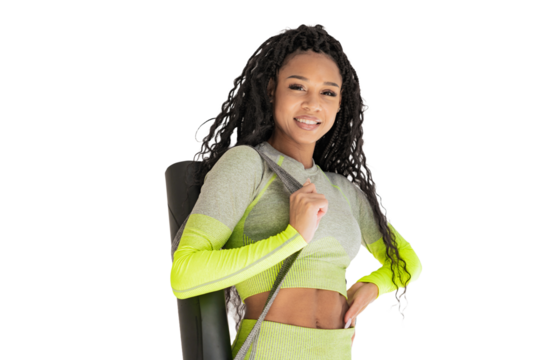 Curly haired female trainer in workout clothes, cut out