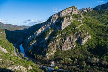 Sicevo Gorge (Sicevacka klisura) in Serbia. Mountains and river on early spring sunny day. The gorge in the middle of mountains.
