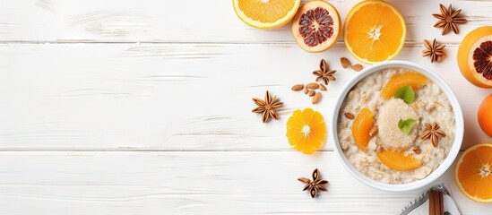 Bowl of porridge with citrus fruits and spice