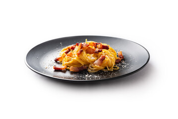Piatto di spaghetti alla carbonara su fondo bianco, ricetta tradizionale di pasta italiana, cibo europeo  - 793811273
