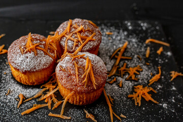 Carrot  muffins on dark background.Healthy carrot cake muffins