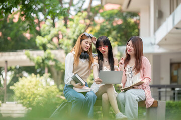 Asian young campus student enjoy learn study and reading books together. Friendship and Education concept. Campus school and university. Happiness and funny of learning in college
